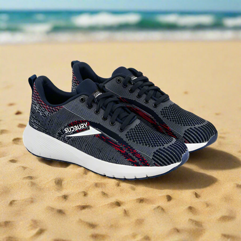 A pair of Sudbury men's running shoes with a navy and red color scheme, featuring a mesh upper material and a white sole.