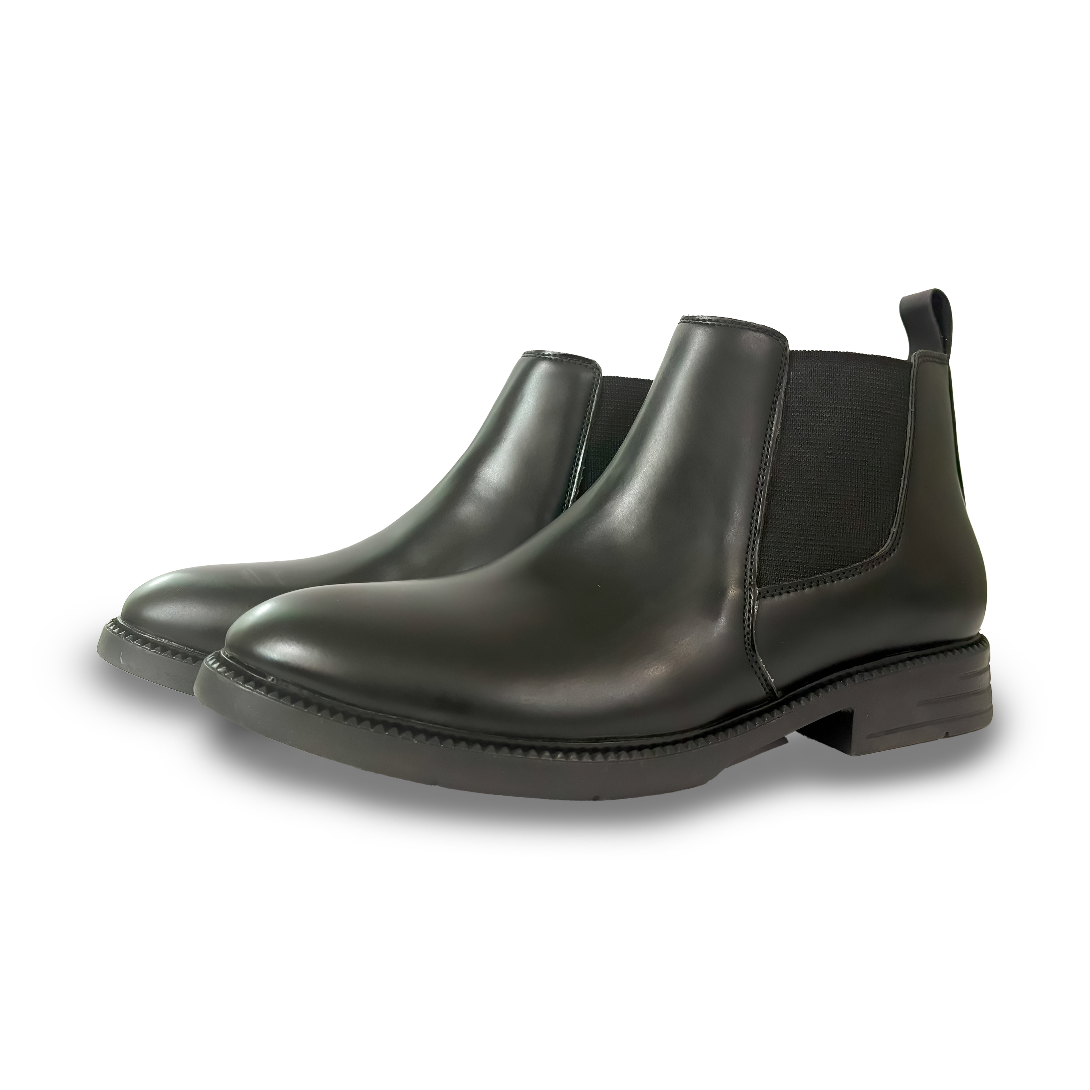 Pair of blqckChelsea boots on a white background