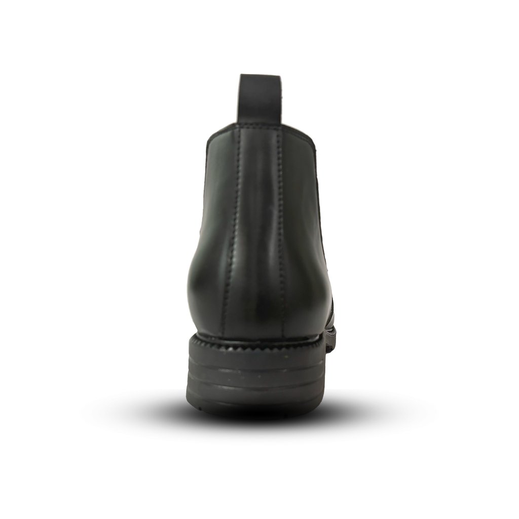 Black leather boot on a white background